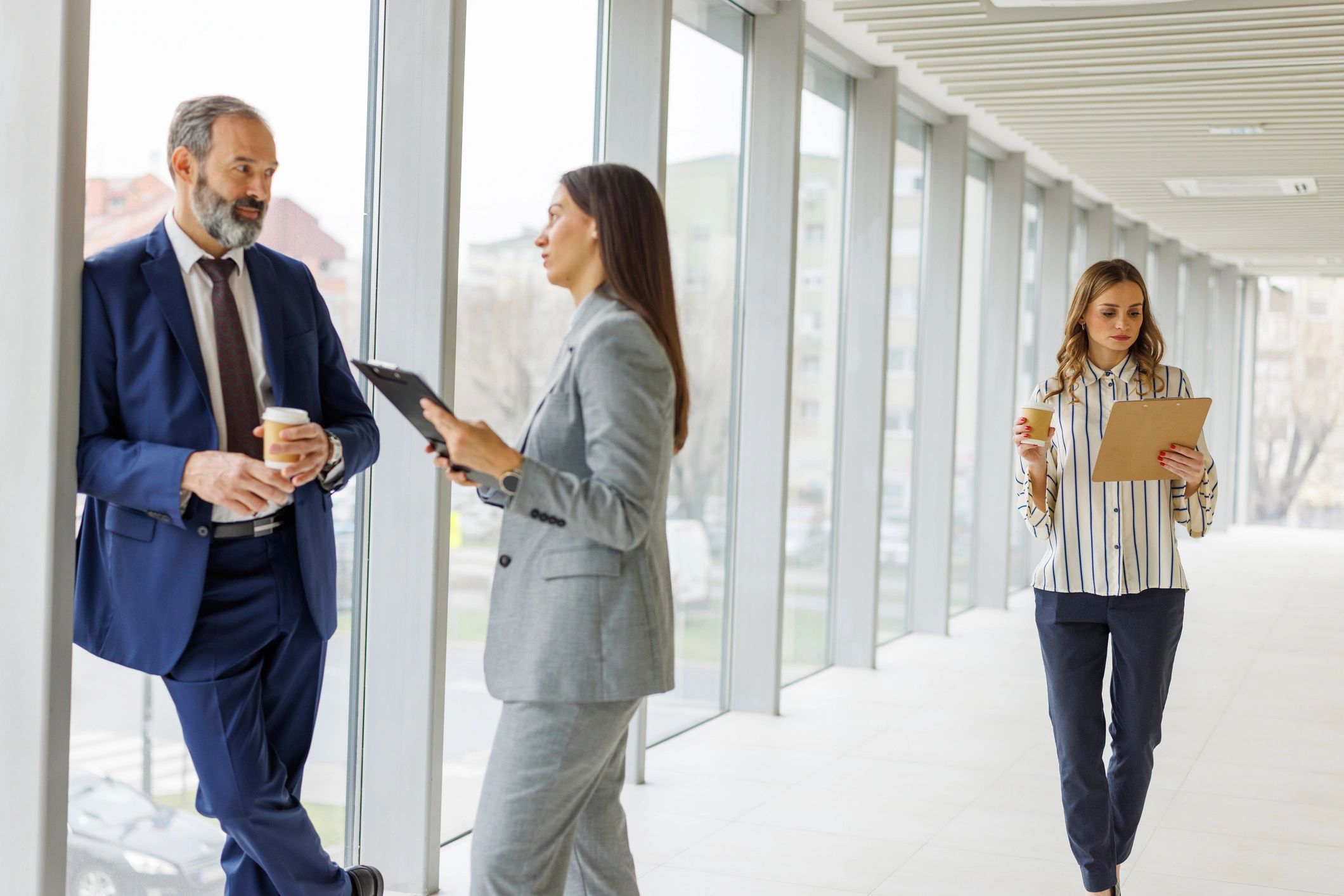 Business professionals collaborating in a modern corporate office